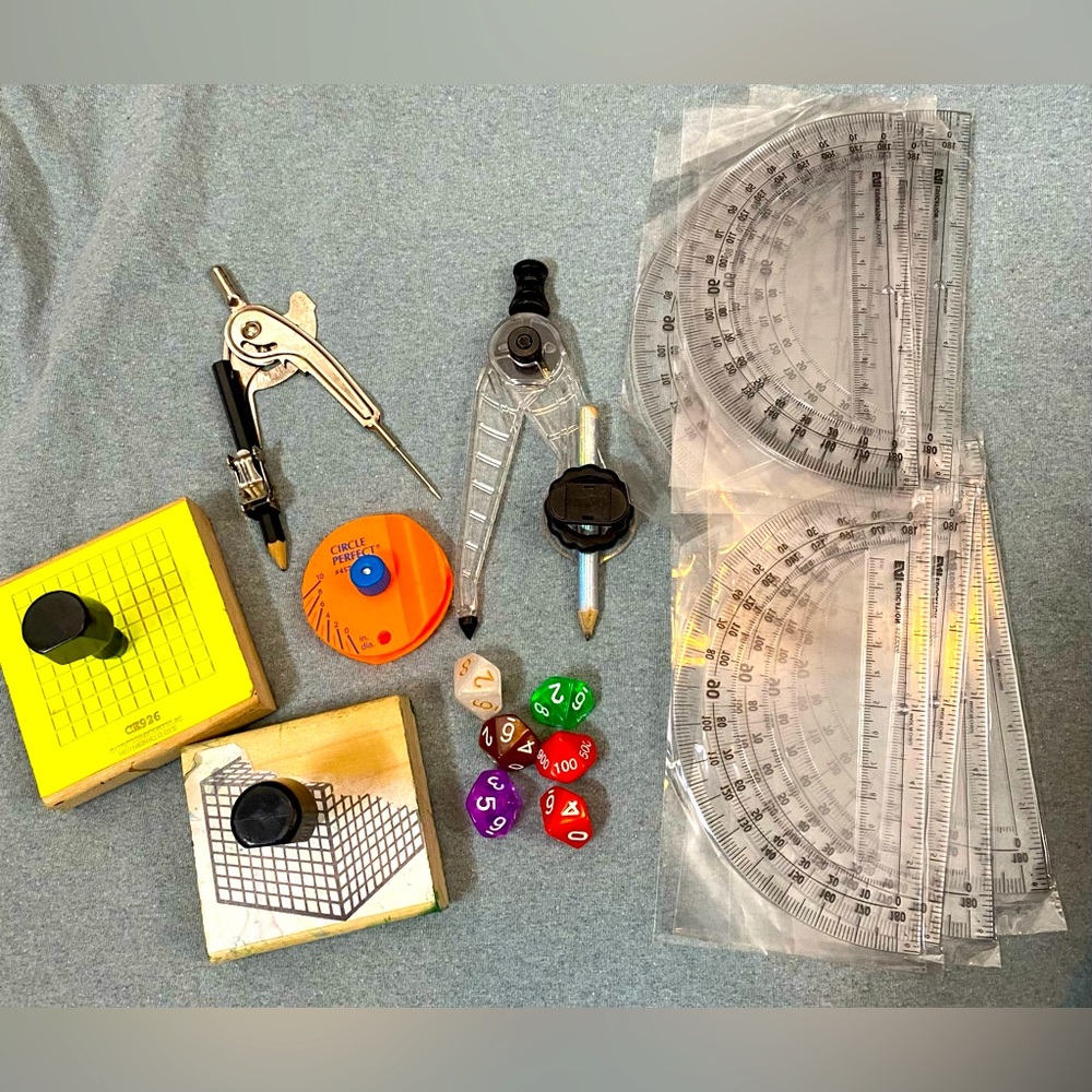 Protractors, compass, dice , stamps
